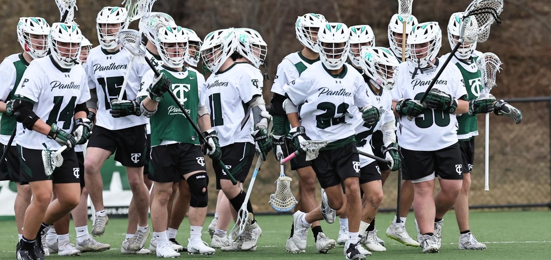 TC3 lacrosse team huddled together
