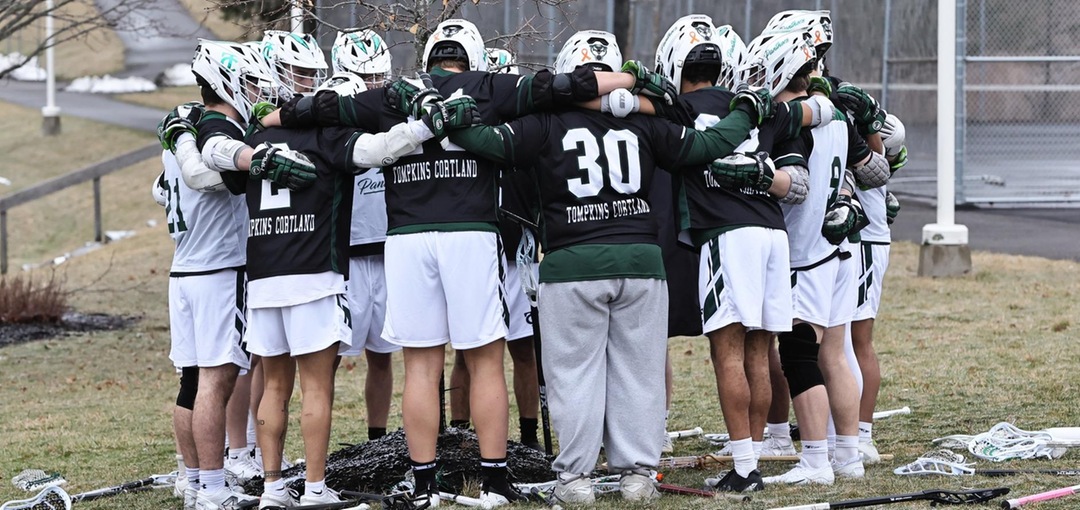 Panthers lacrosse team huddles before a game earlier this year